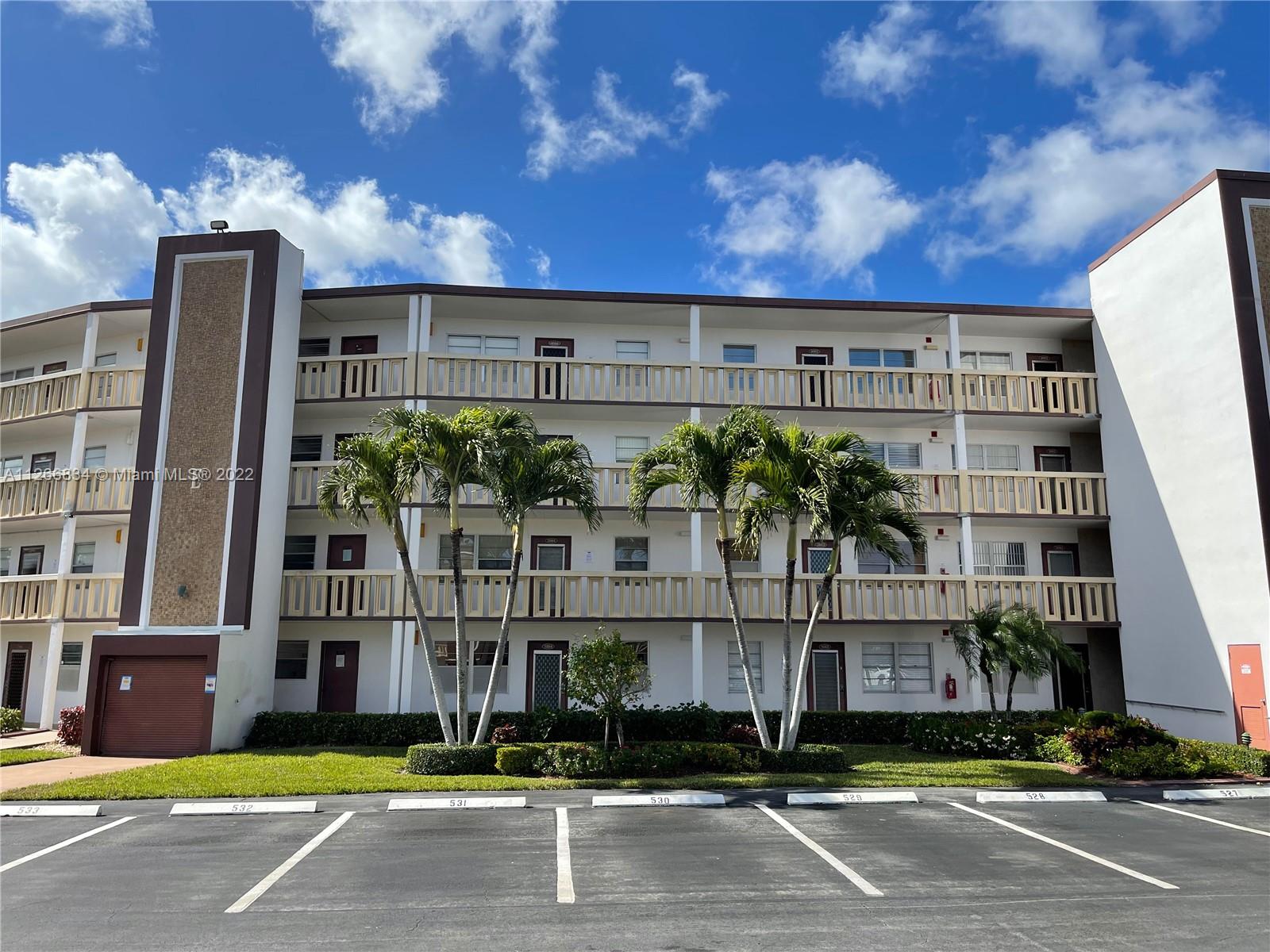 a view of a building with a pathway