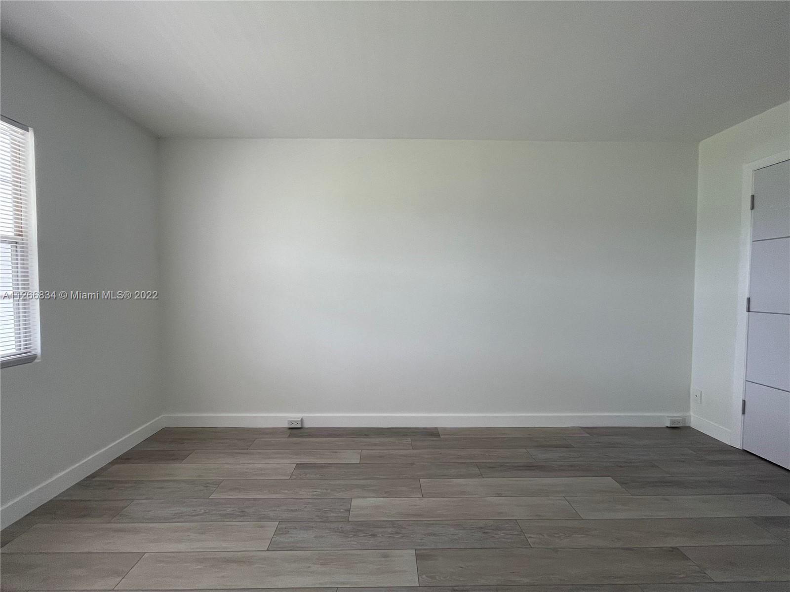 1084 Guildford East Boca Raton, FL 33434 - Photo 28 of 34 a view of an empty room