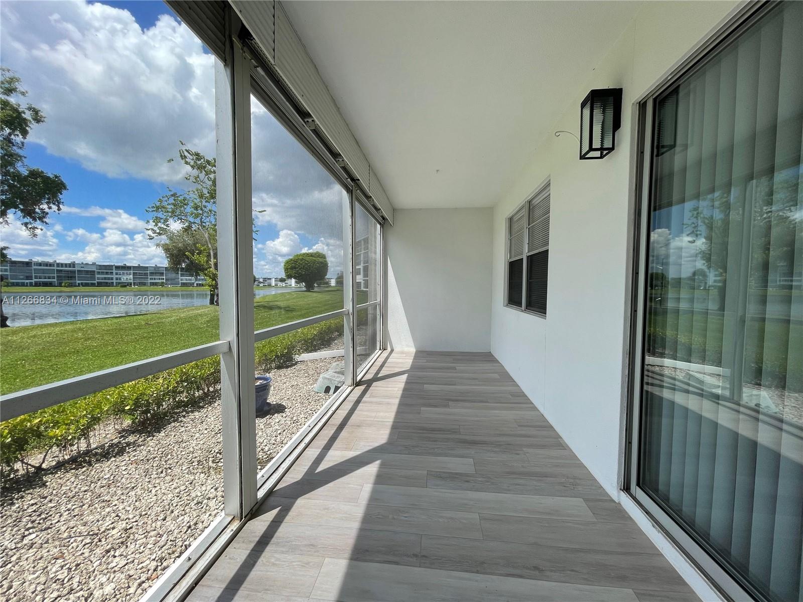1084 Guildford East Boca Raton, FL 33434 - Photo 32 of 34 a view of a balcony with ocean view