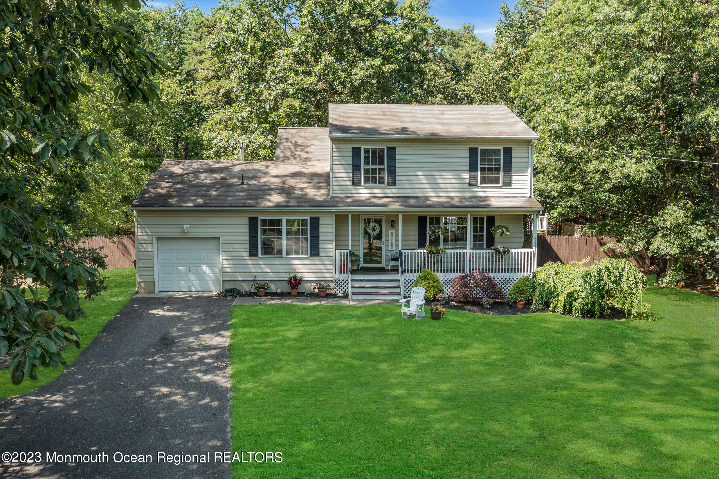 505 Leesville Road Jackson, NJ 08527 - Photo 49 of 58 a view of a house with a yard and sitting area