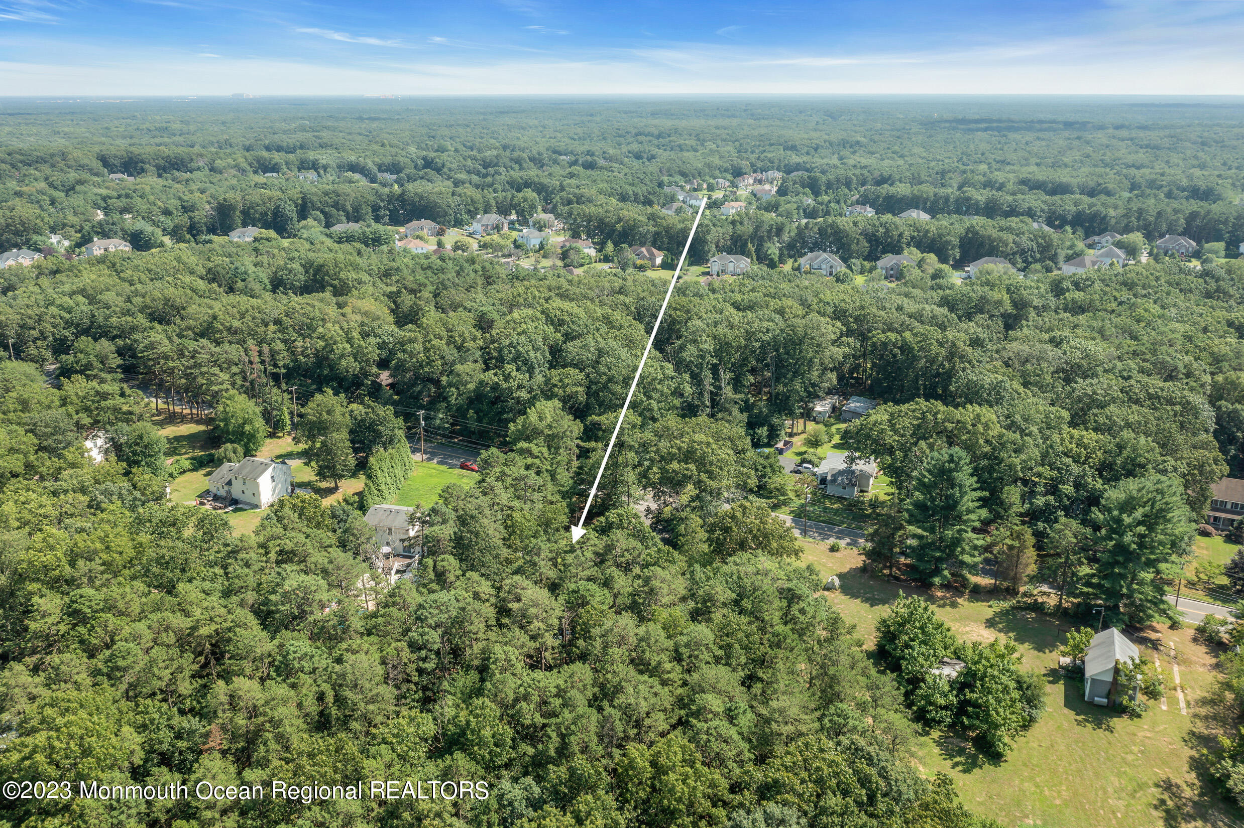 505 Leesville Road Jackson, NJ 08527 - Photo 54 of 58 a view of a city with lush green forest