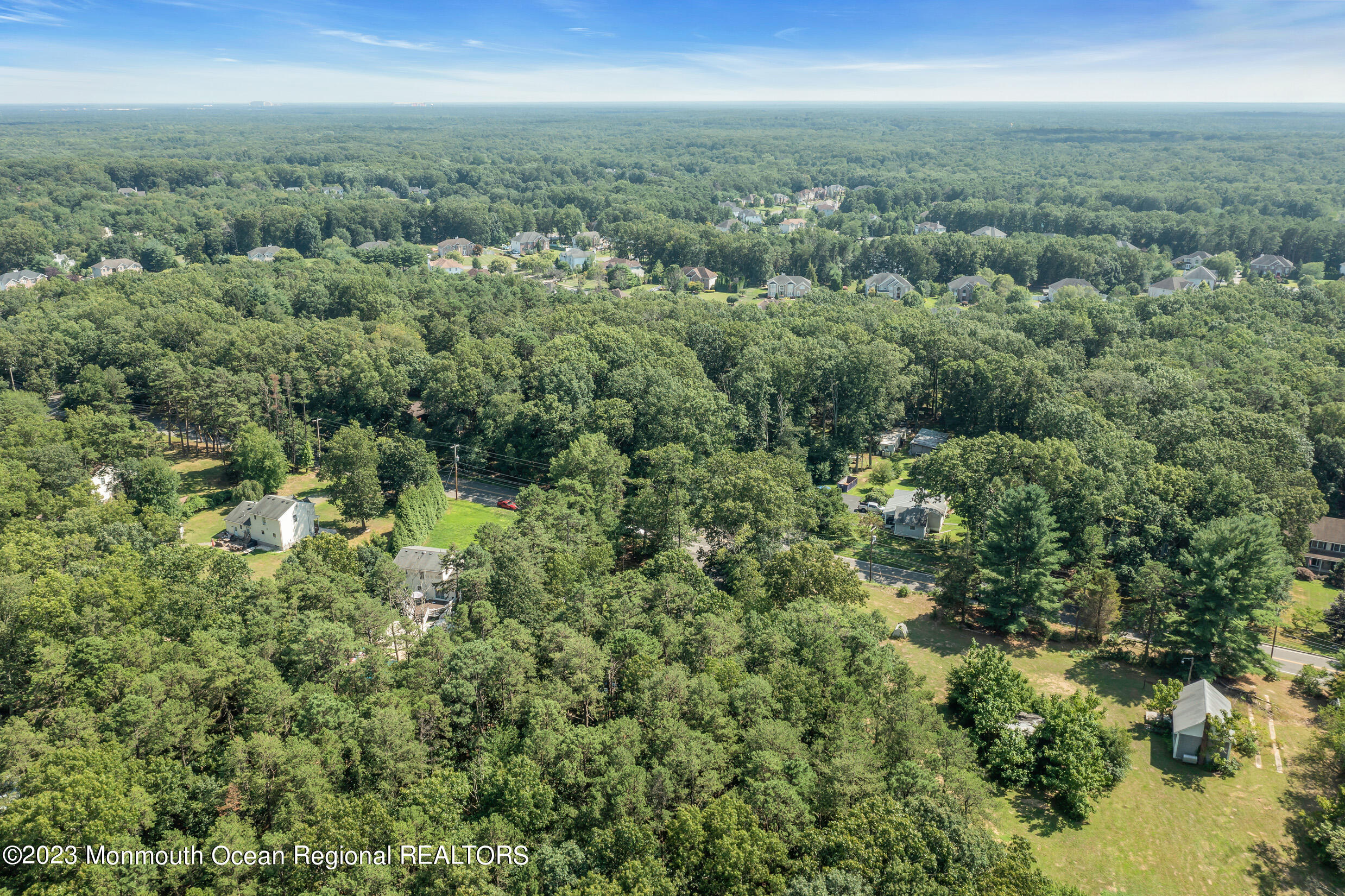 505 Leesville Road Jackson, NJ 08527 - Photo 55 of 58 an aerial view of residential houses with outdoor and green space