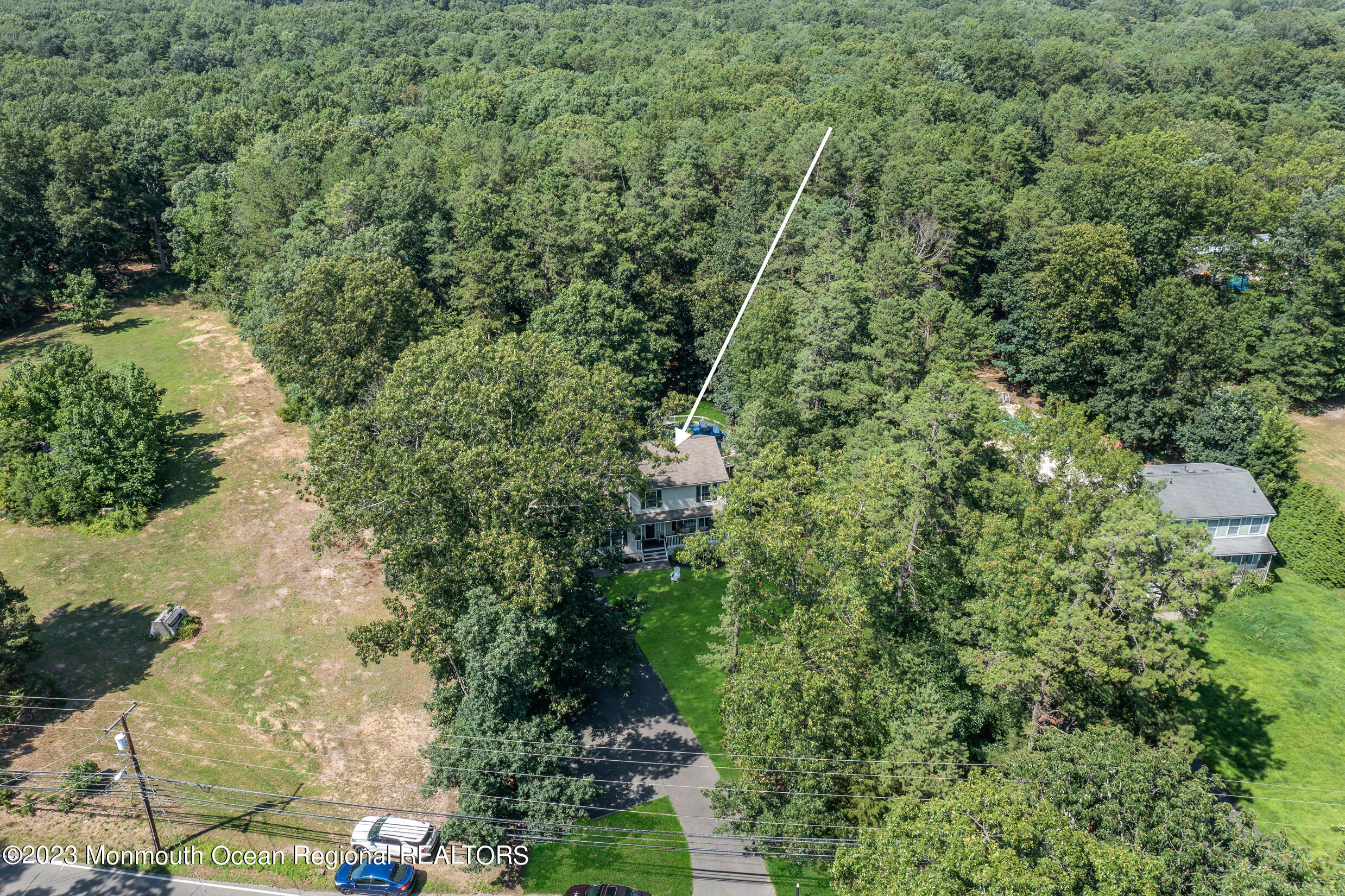 505 Leesville Road Jackson, NJ 08527 - Photo 57 of 58 a view of a yard with plants and large trees