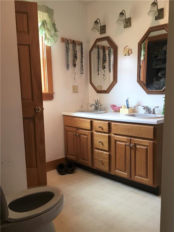 570 Monroe Road Winterport, ME 04496 - Photo 12 of 33 Master bath with double sinks.