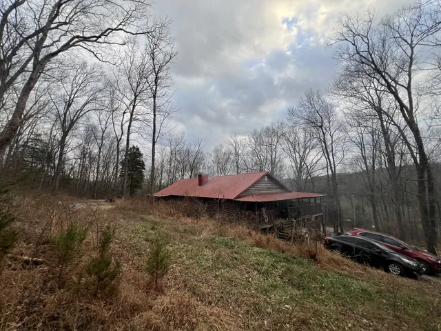 a view of a bathroom with a sink and mirror