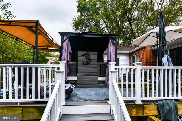 a view of swimming pool with a deck
