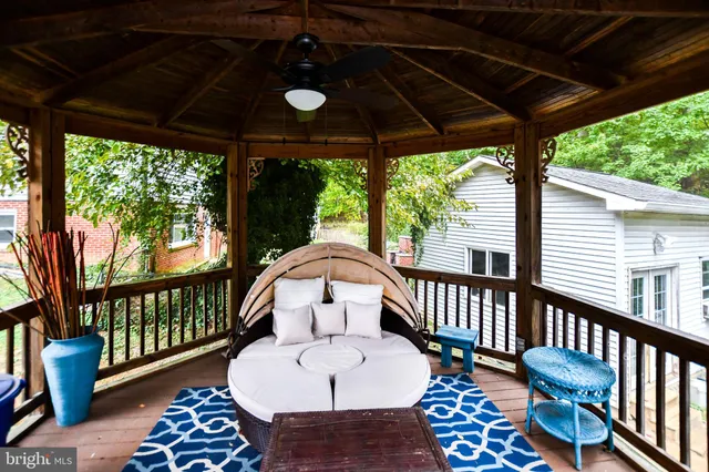a view of a patio with a table chairs and a patio