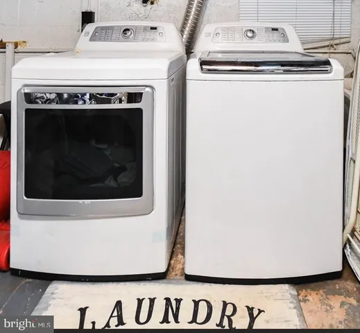 a close view of a fireplace with a washer and dryer