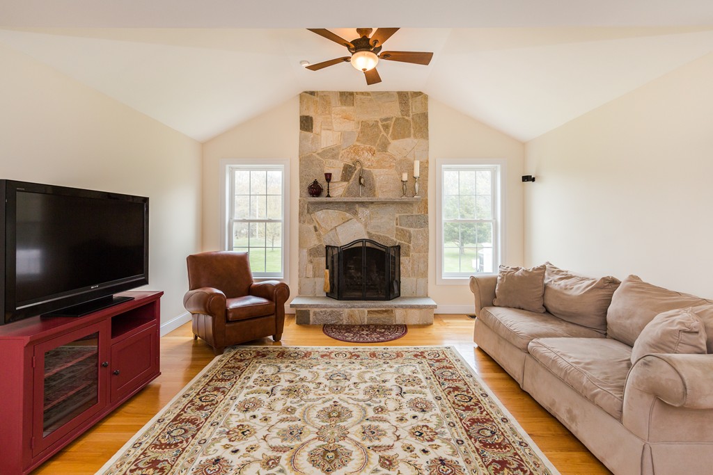 59 Ferry Road Salisbury, MA 01952 - Photo 11 of 30 a living room with furniture and a flat screen tv