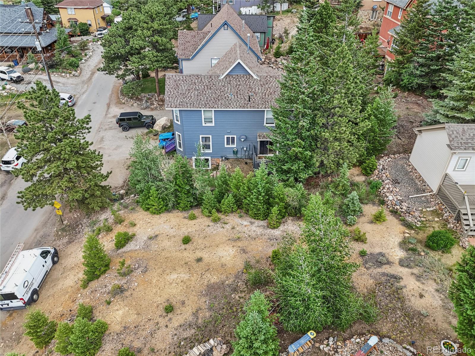 0 Main Street Georgetown, CO 80444 - Photo 6 of 15 a aerial view of a house with a yard and large tree