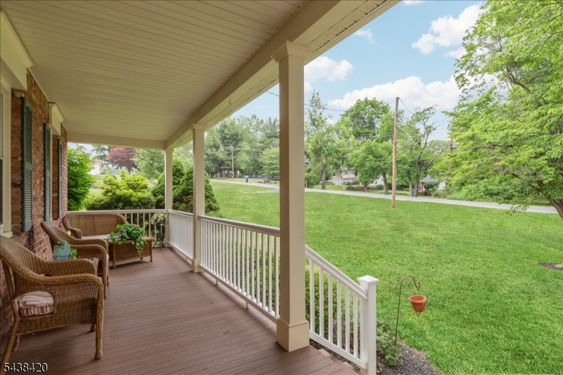 79 Main Street Califon, NJ 07830 - Photo 29 of 50 a view of a porch with furniture and garden