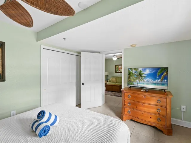 a bathroom with a sink toilet and mirror