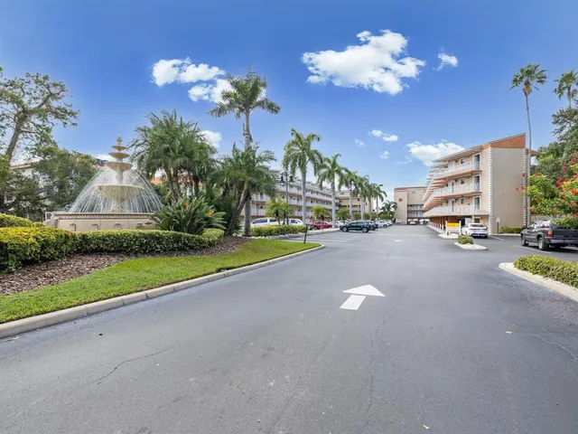a view of a living room and kitchen