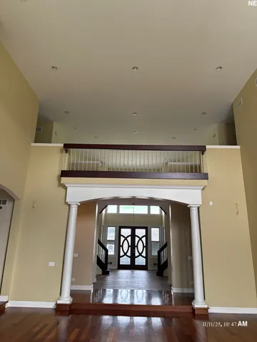 a view of entryway with wooden floor