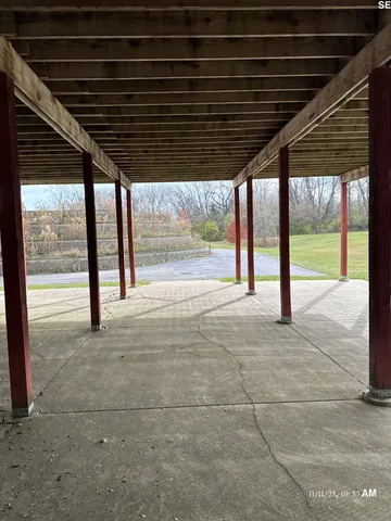 a view of porch with green space