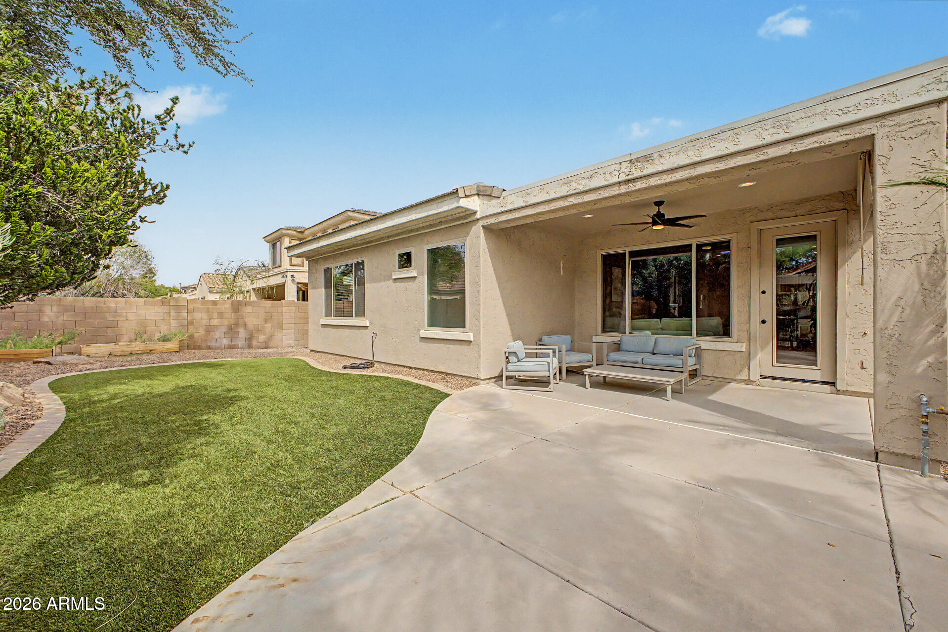 4272 East Buckboard Road Gilbert, AZ 85297 - Photo 36 of 37 a view of a house with backyard and porch