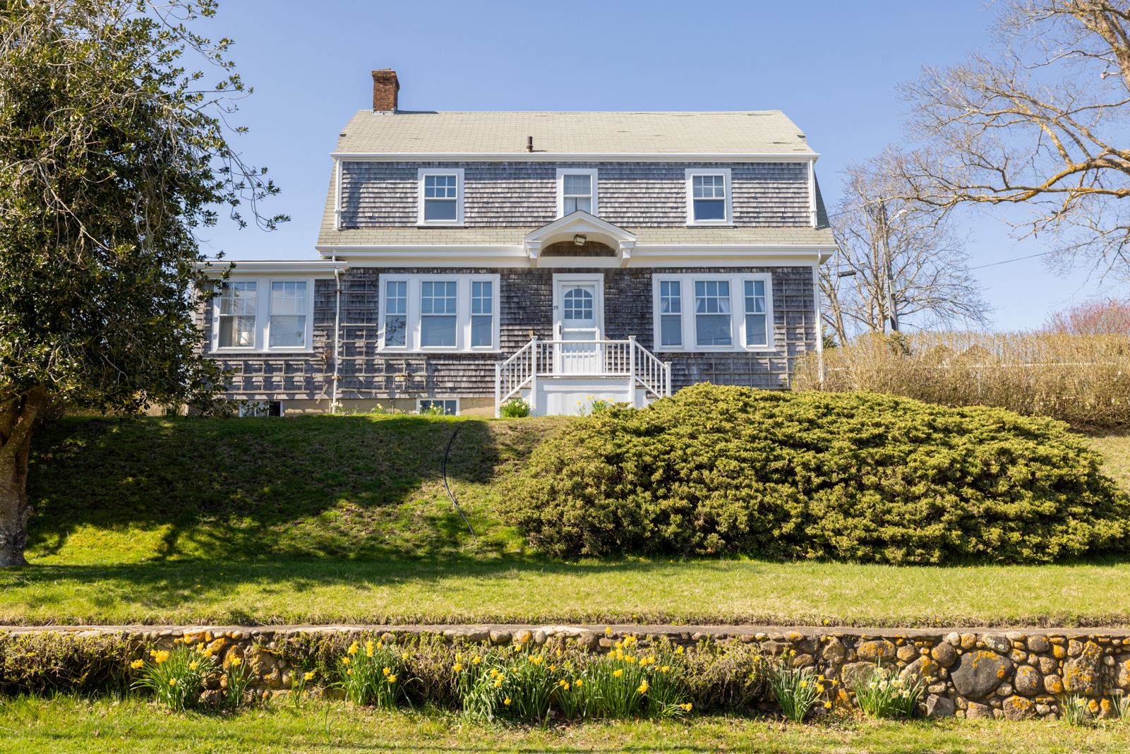35 West Chester Street Nantucket, MA 02554 - Photo 12 of 14 a front view of a house with a yard
