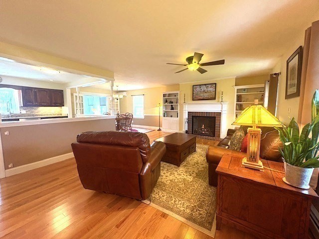 71 Old Amesbury Line Road Haverhill, MA 01830 - Photo 3 of 40 a living room with furniture fireplace and flat screen tv