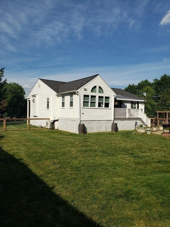 71 Old Amesbury Line Road Haverhill, MA 01830 - Photo 40 of 40 a front view of a house with a garden