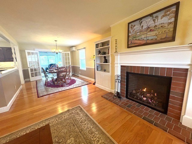 71 Old Amesbury Line Road Haverhill, MA 01830 - Photo 7 of 40 a living room with furniture and a fireplace