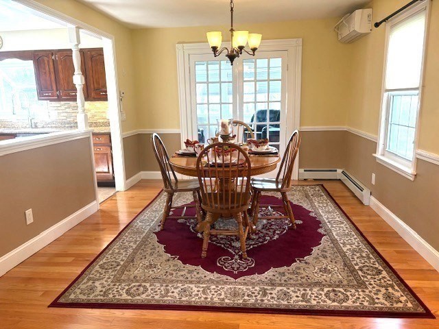 71 Old Amesbury Line Road Haverhill, MA 01830 - Photo 10 of 40 a view of a dining room with furniture window and wooden floor