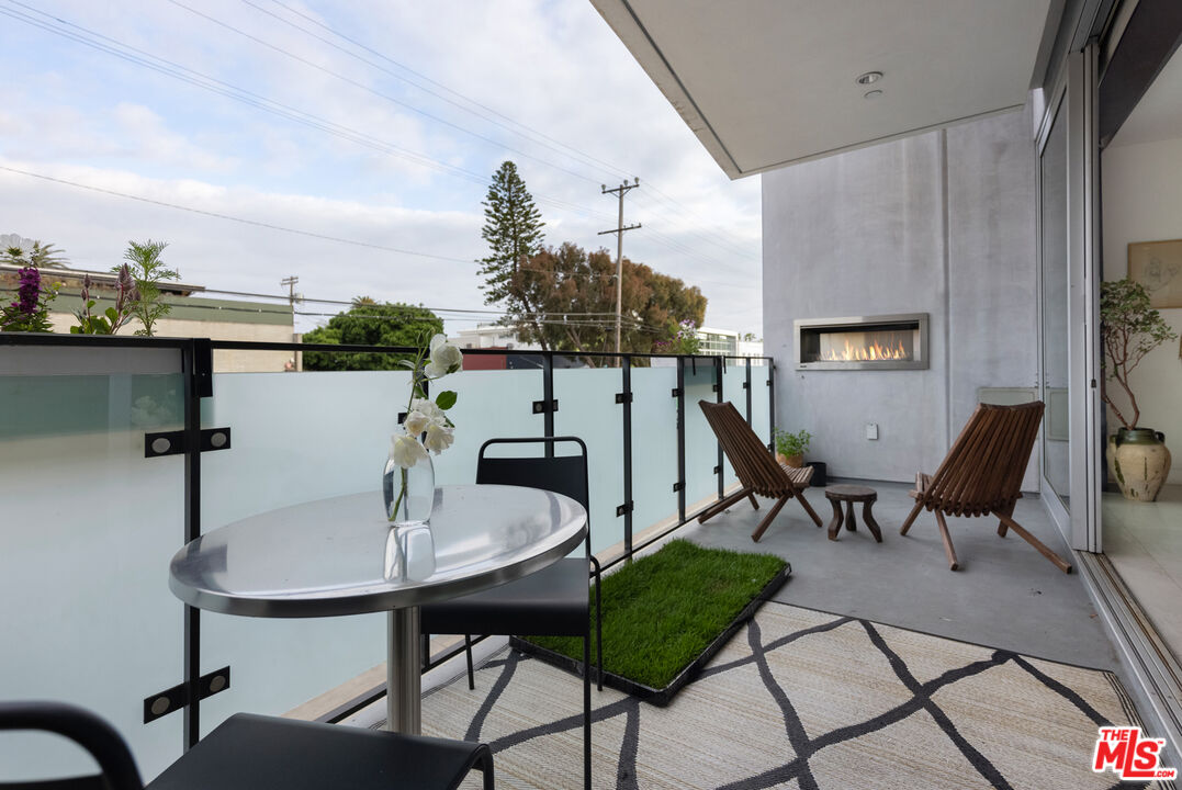 351 Sunset Avenue, Unit 5 Venice, CA 90291 - Photo 12 of 29 a view of a dining room with furniture and wooden floor