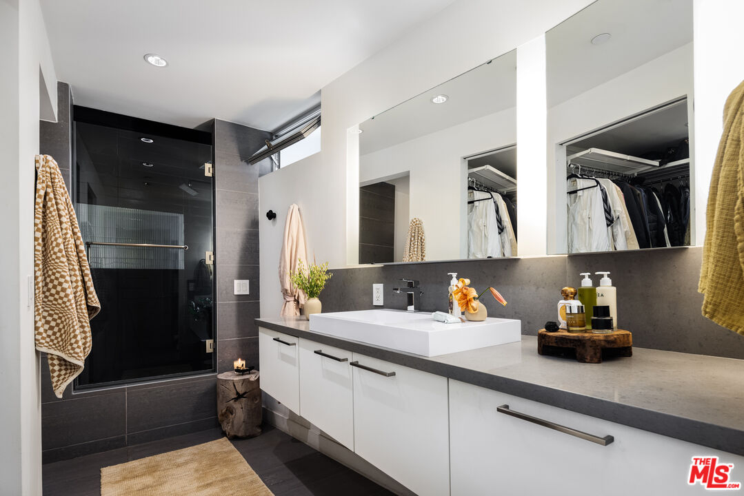351 Sunset Avenue, Unit 5 Venice, CA 90291 - Photo 18 of 29 a bathroom with a sink and a mirror