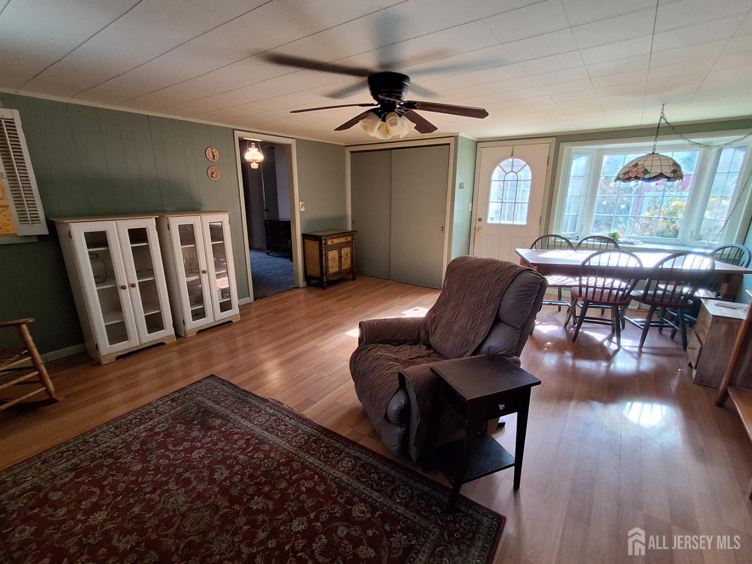 6 Nicholas Court Milltown, NJ 08850 - Photo 12 of 30 a living room with furniture and wooden floor