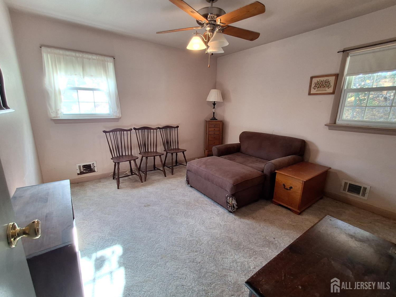 6 Nicholas Court Milltown, NJ 08850 - Photo 17 of 30 a living room with furniture and a window