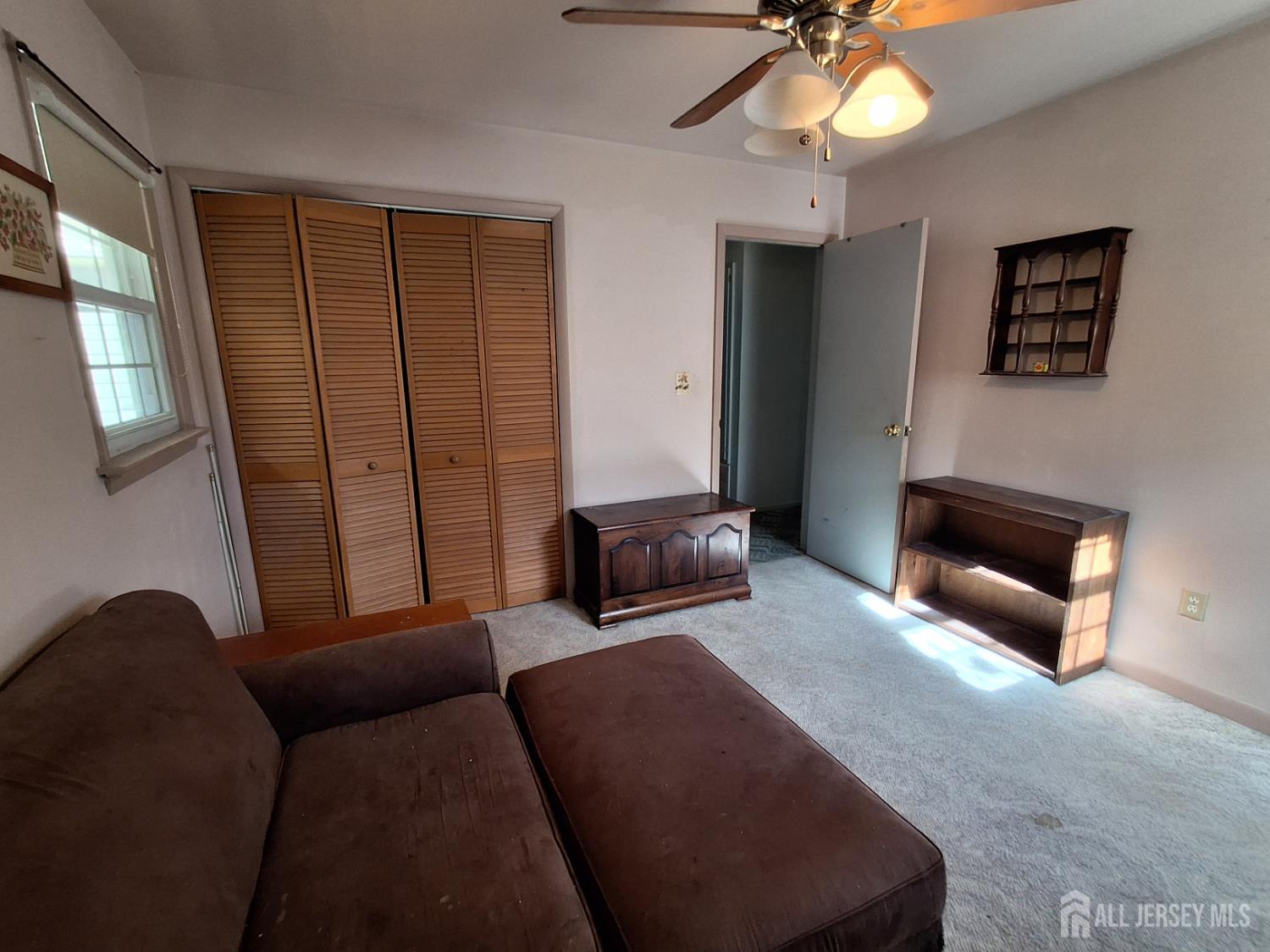 6 Nicholas Court Milltown, NJ 08850 - Photo 18 of 30 a bedroom with furniture and a fireplace