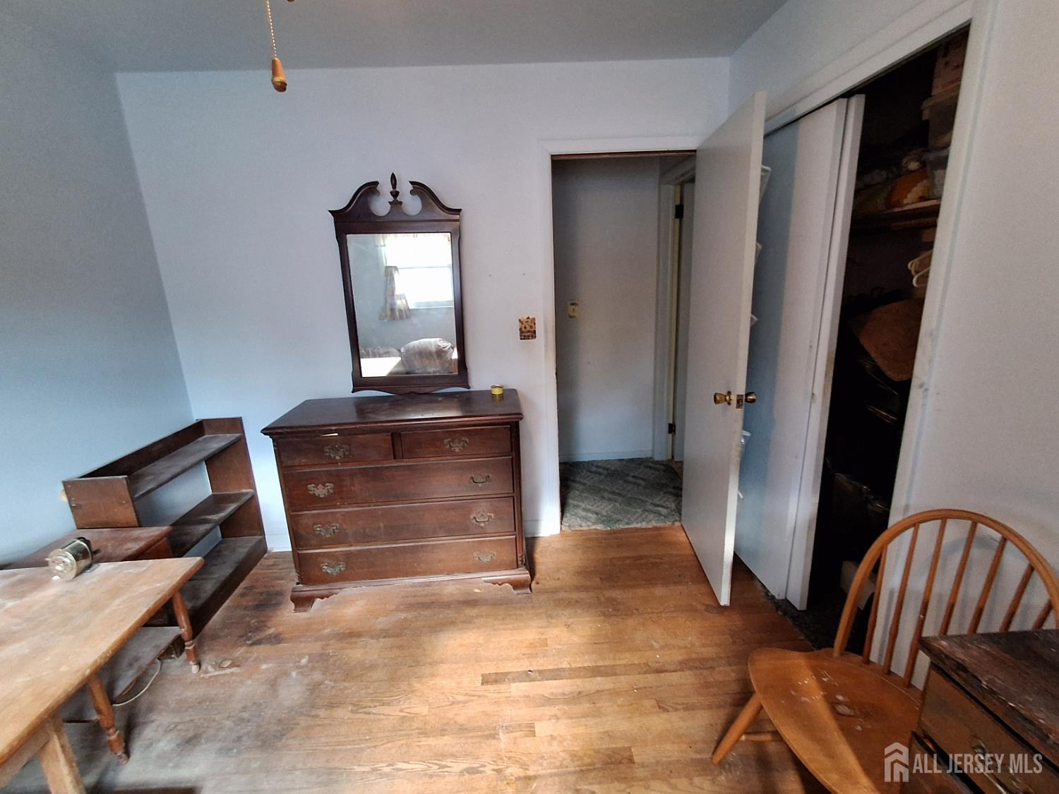 6 Nicholas Court Milltown, NJ 08850 - Photo 20 of 30 a view of a hallway to a livingroom with furniture