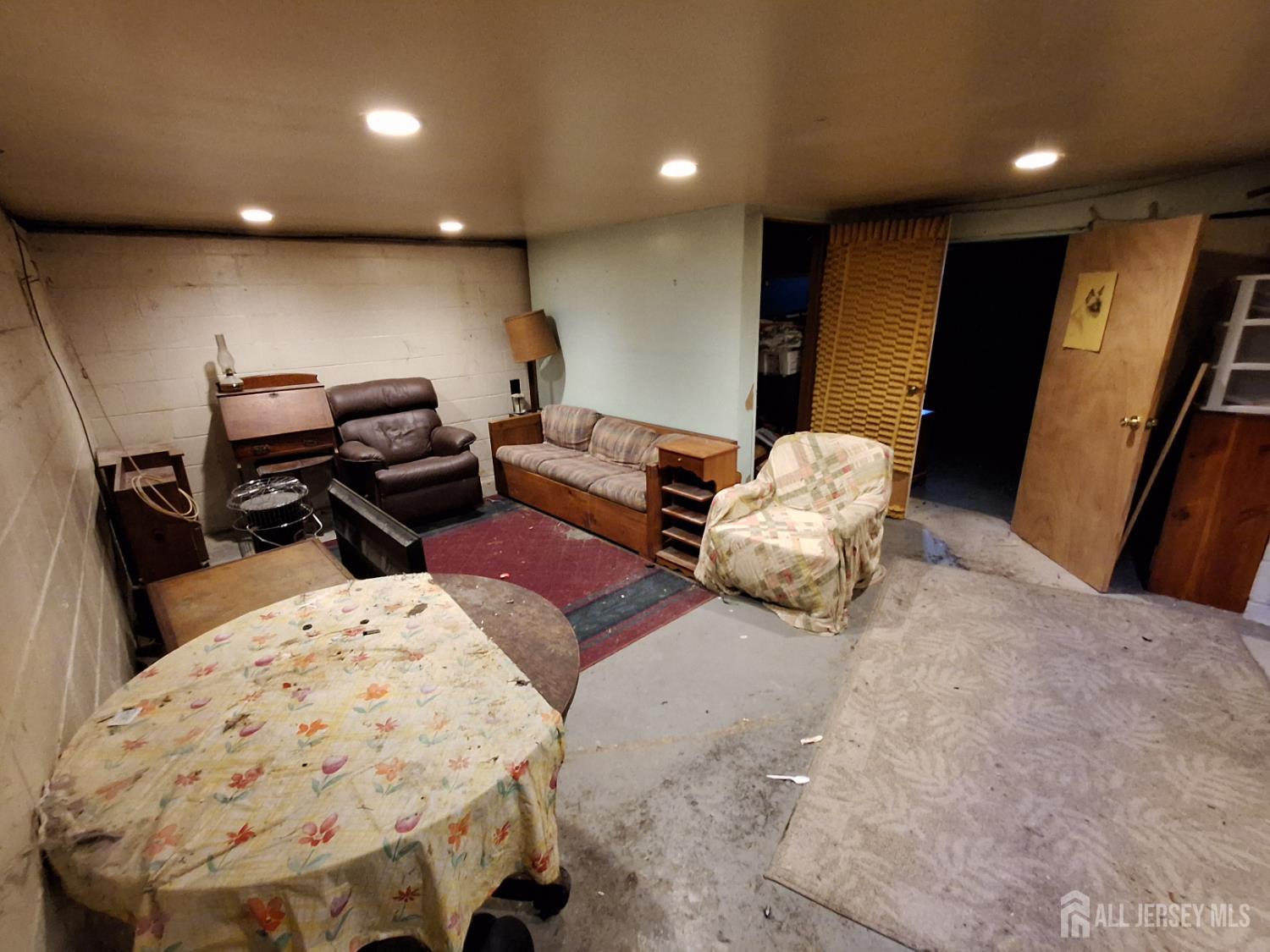 6 Nicholas Court Milltown, NJ 08850 - Photo 25 of 30 a living room with furniture and a large window