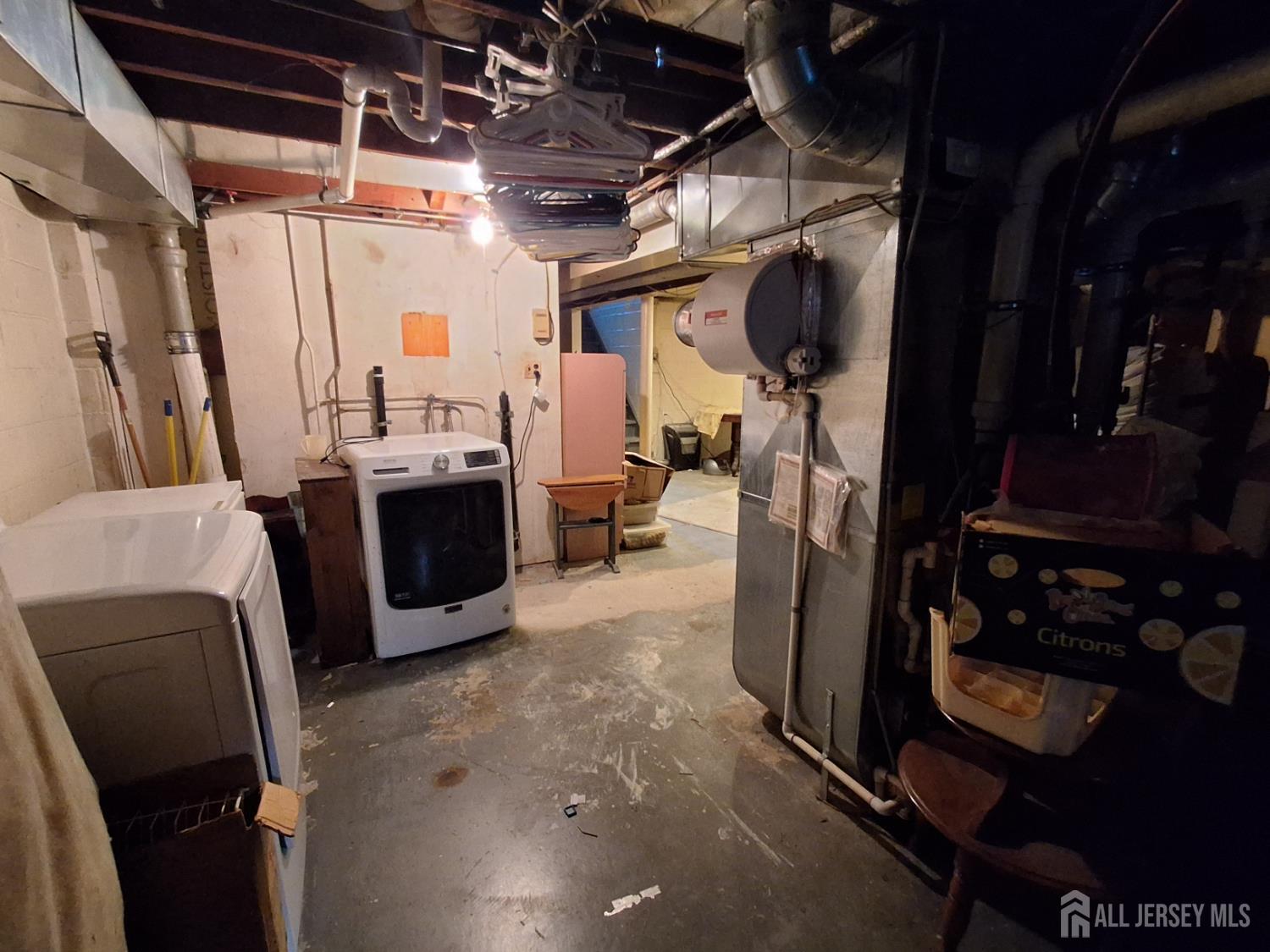 6 Nicholas Court Milltown, NJ 08850 - Photo 29 of 30 a utility room with dryer and washer