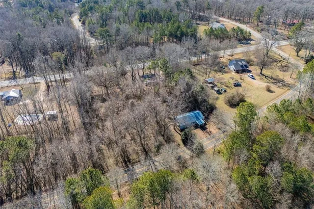 an aerial view of residential house with outdoor space