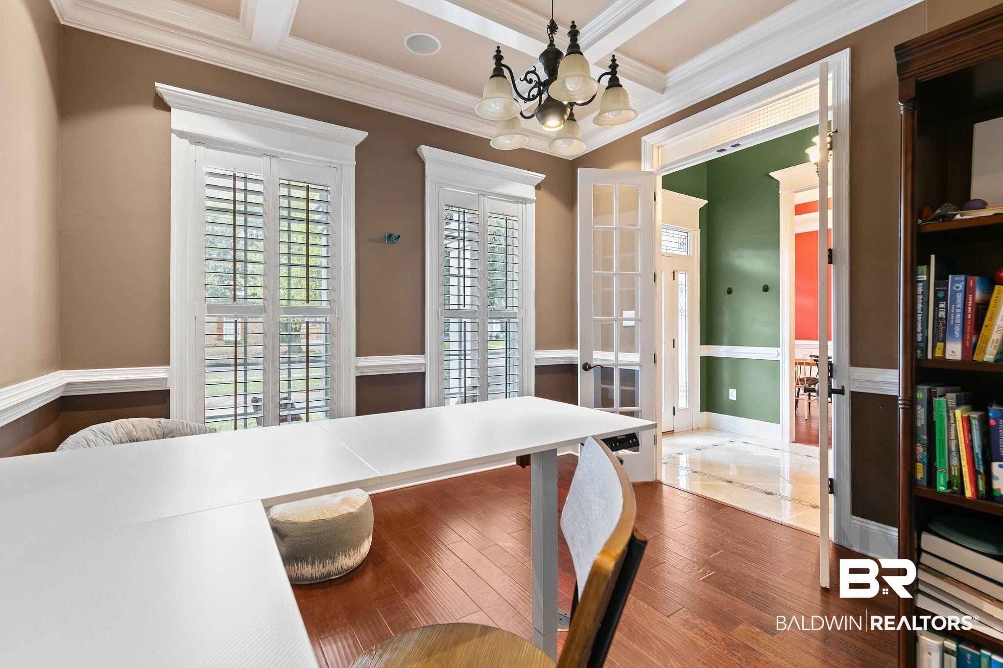 3668 Claridge Road North Mobile, AL 36608 - Photo 36 of 100 Dining room with a chandelier, ornamental molding, dark wood-style flooring, coffered ceiling, and french doors