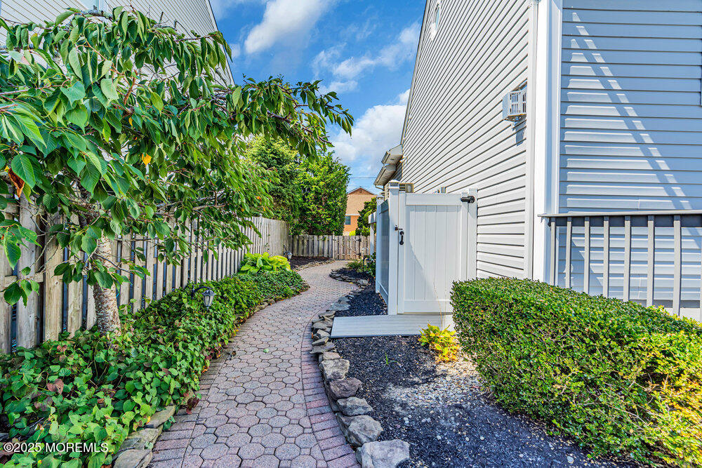 1648 Center Street Point Pleasant, NJ 08742 - Photo 20 of 26 a view of a pathway with a house