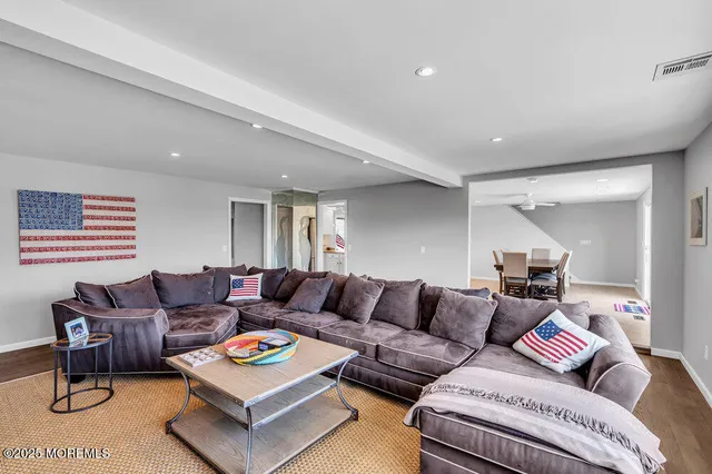 a living room with furniture and a couch