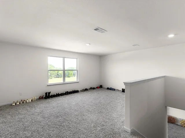 a kitchen with a sink stove and microwave