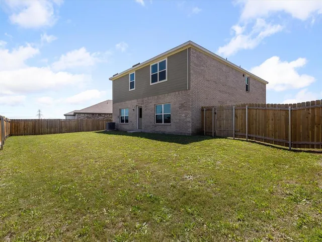 a room with a bed and a window