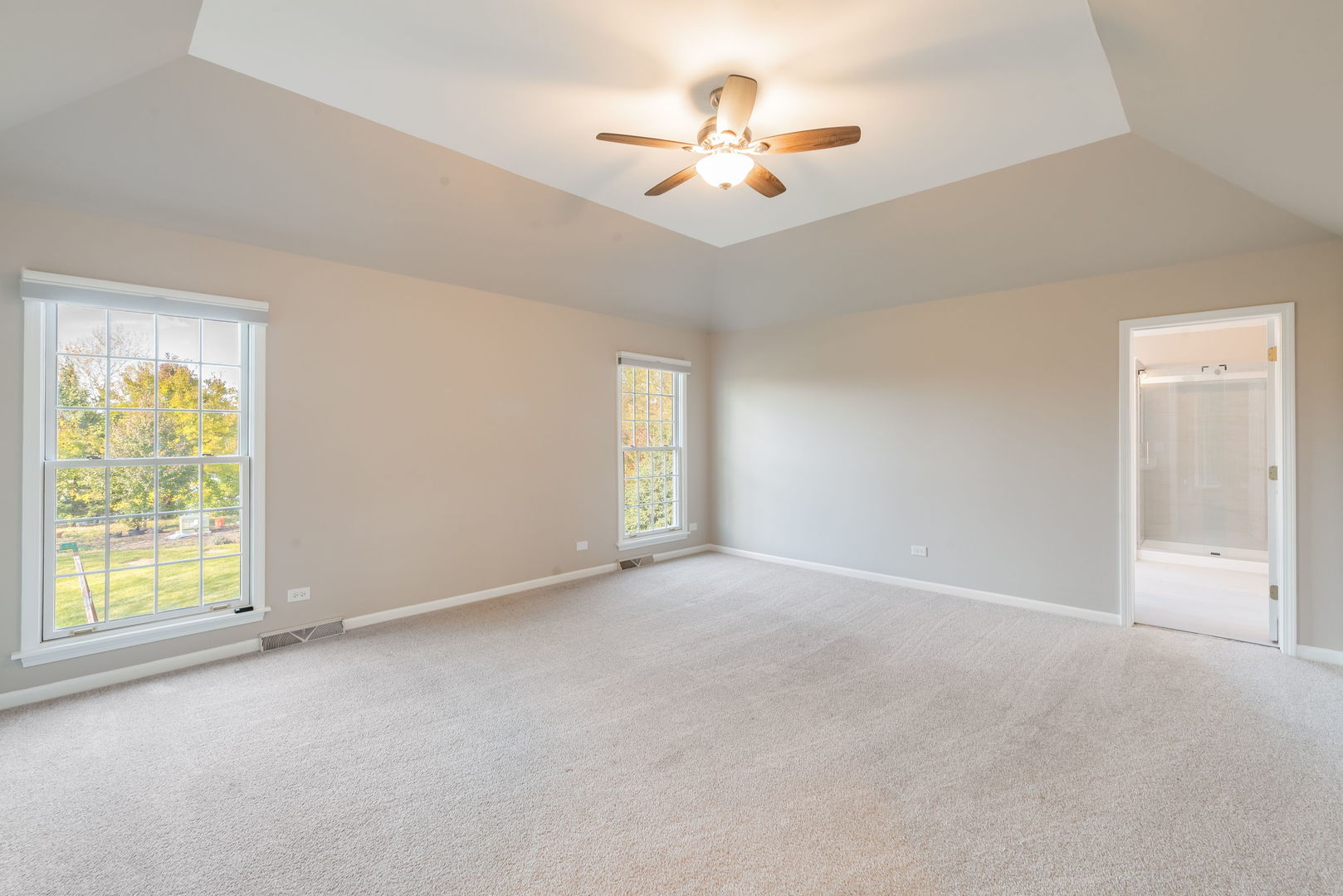 2147 Fargo Boulevard Geneva, IL 60134 - Photo 12 of 27 an empty room with windows and fan