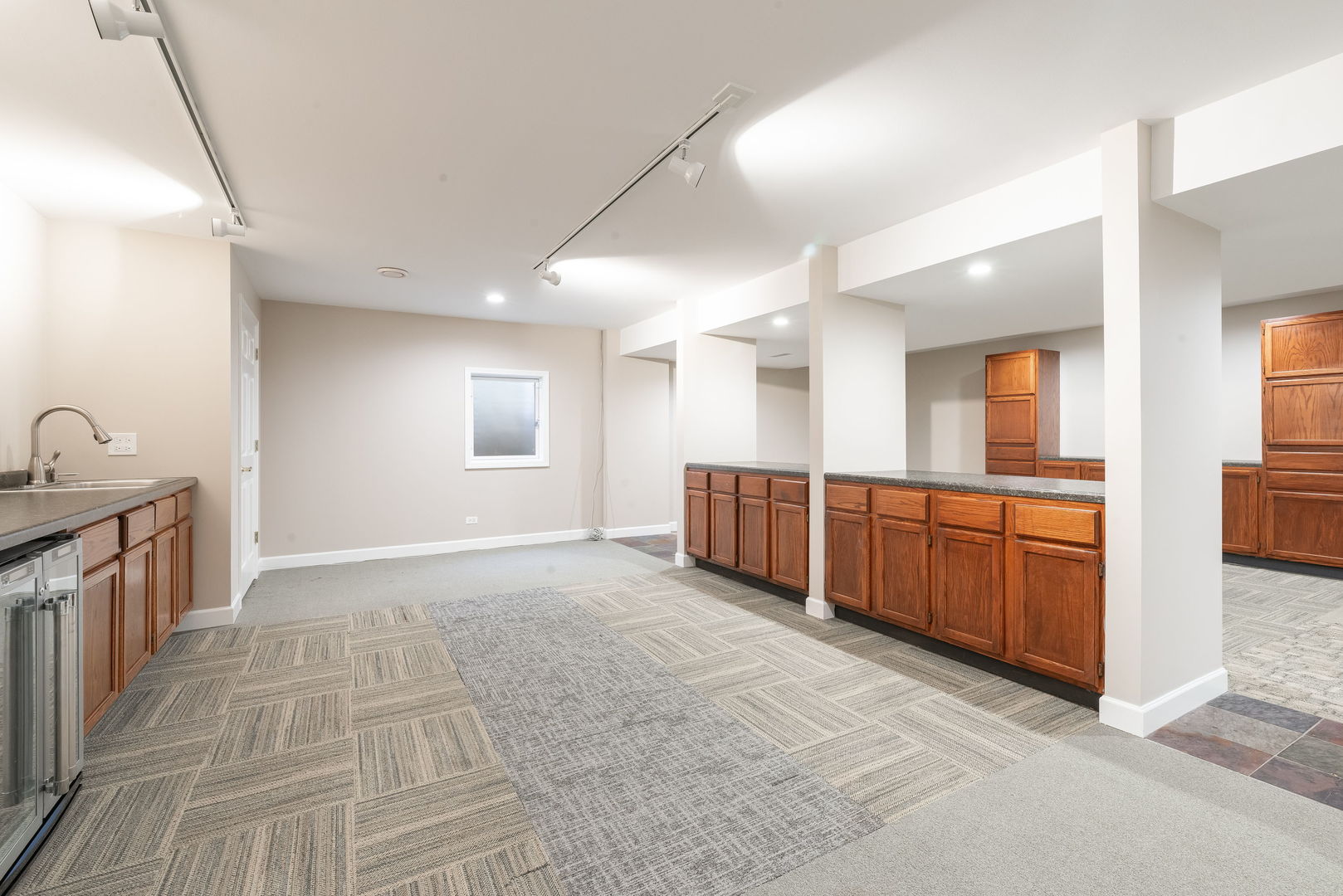 2147 Fargo Boulevard Geneva, IL 60134 - Photo 20 of 27 a view of a kitchen with kitchen island wooden floor and stainless steel appliances