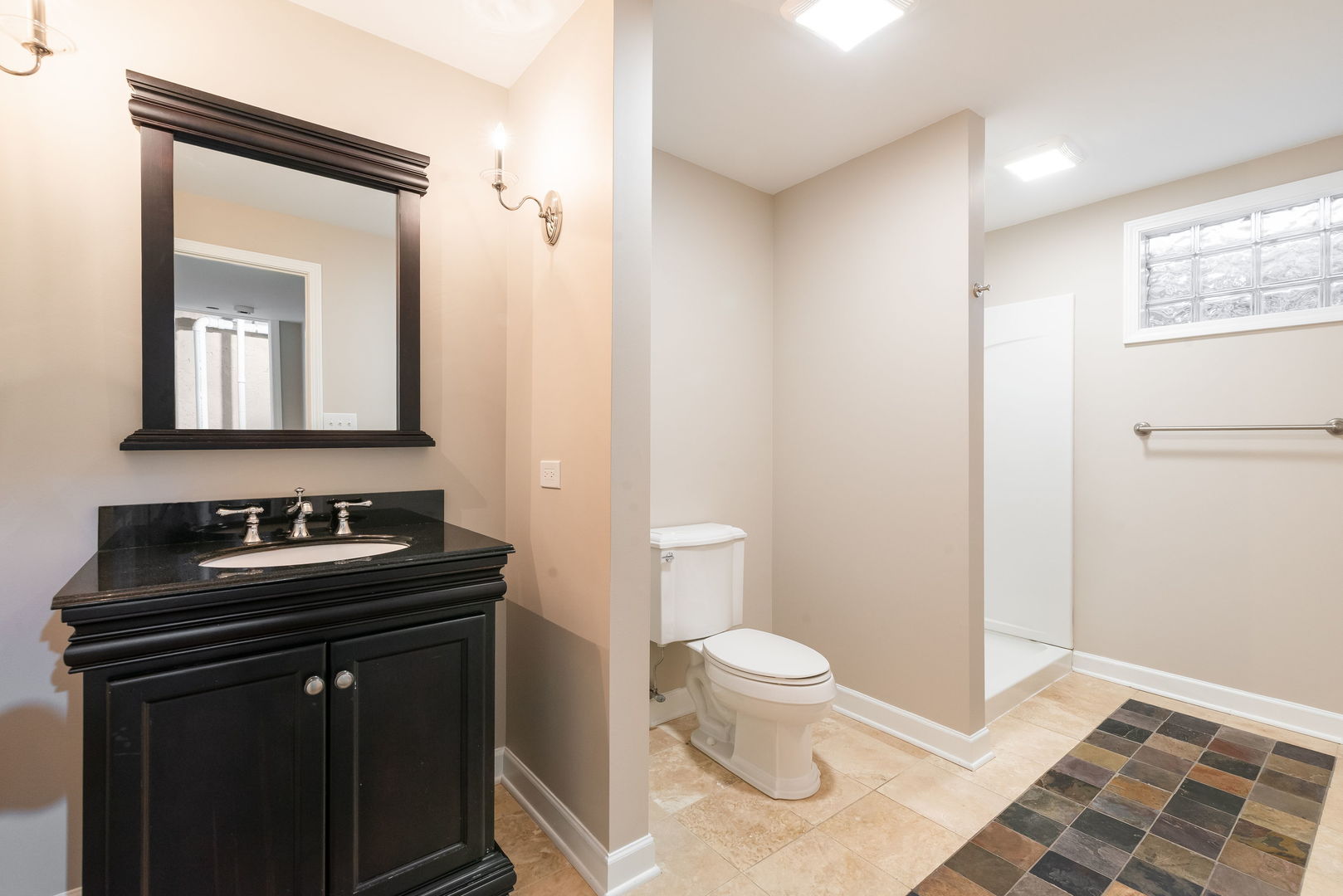 2147 Fargo Boulevard Geneva, IL 60134 - Photo 21 of 27 a bathroom with a sink toilet and mirror