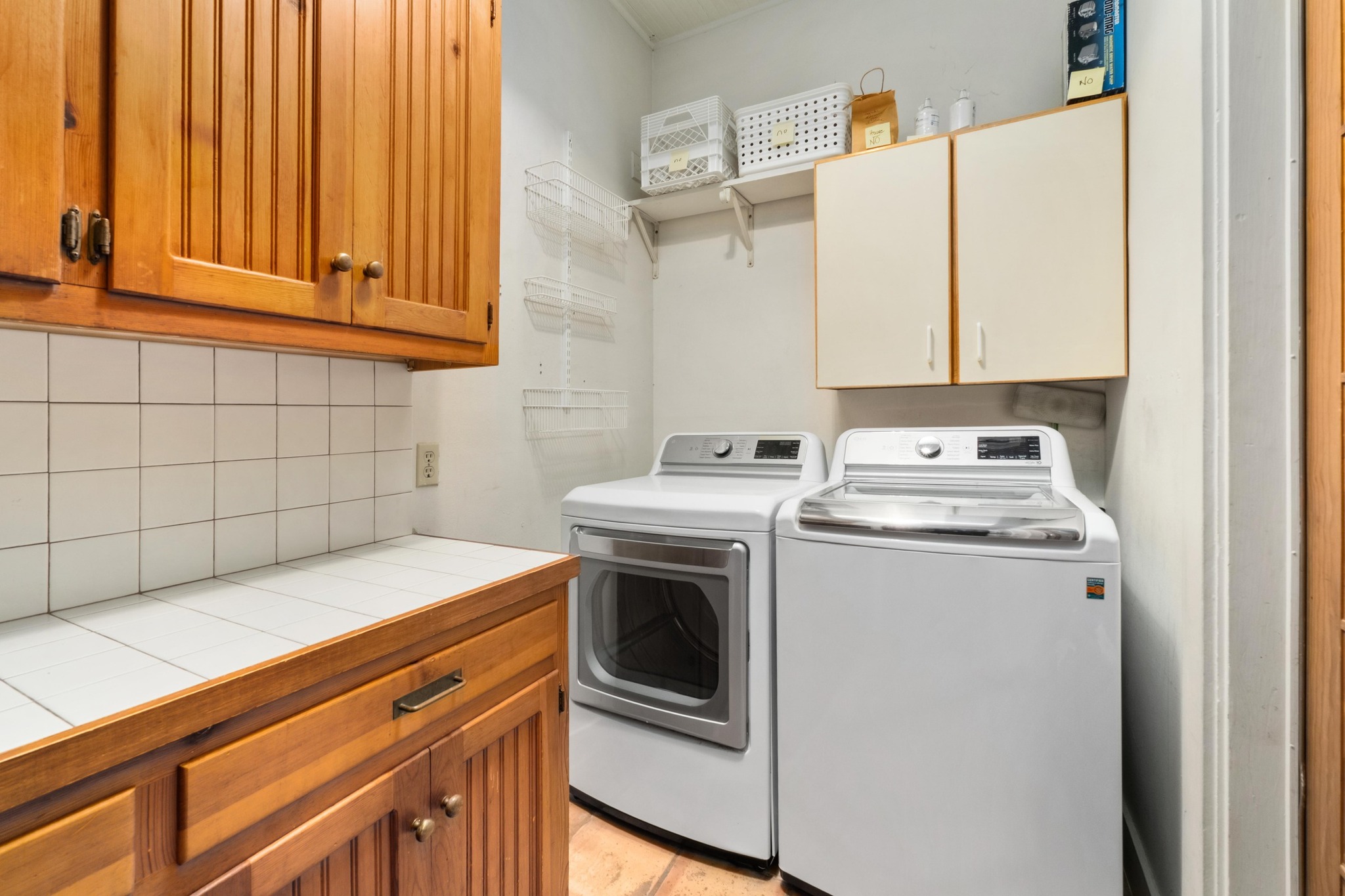 1502 Murray Lane Austin, TX 78703 - Photo 20 of 33 a view of a storage and utility room with washer and dryer