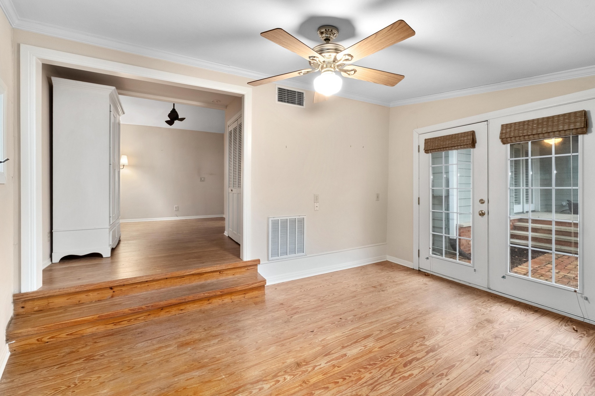 1502 Murray Lane Austin, TX 78703 - Photo 23 of 33 a view of an empty room with wooden floor