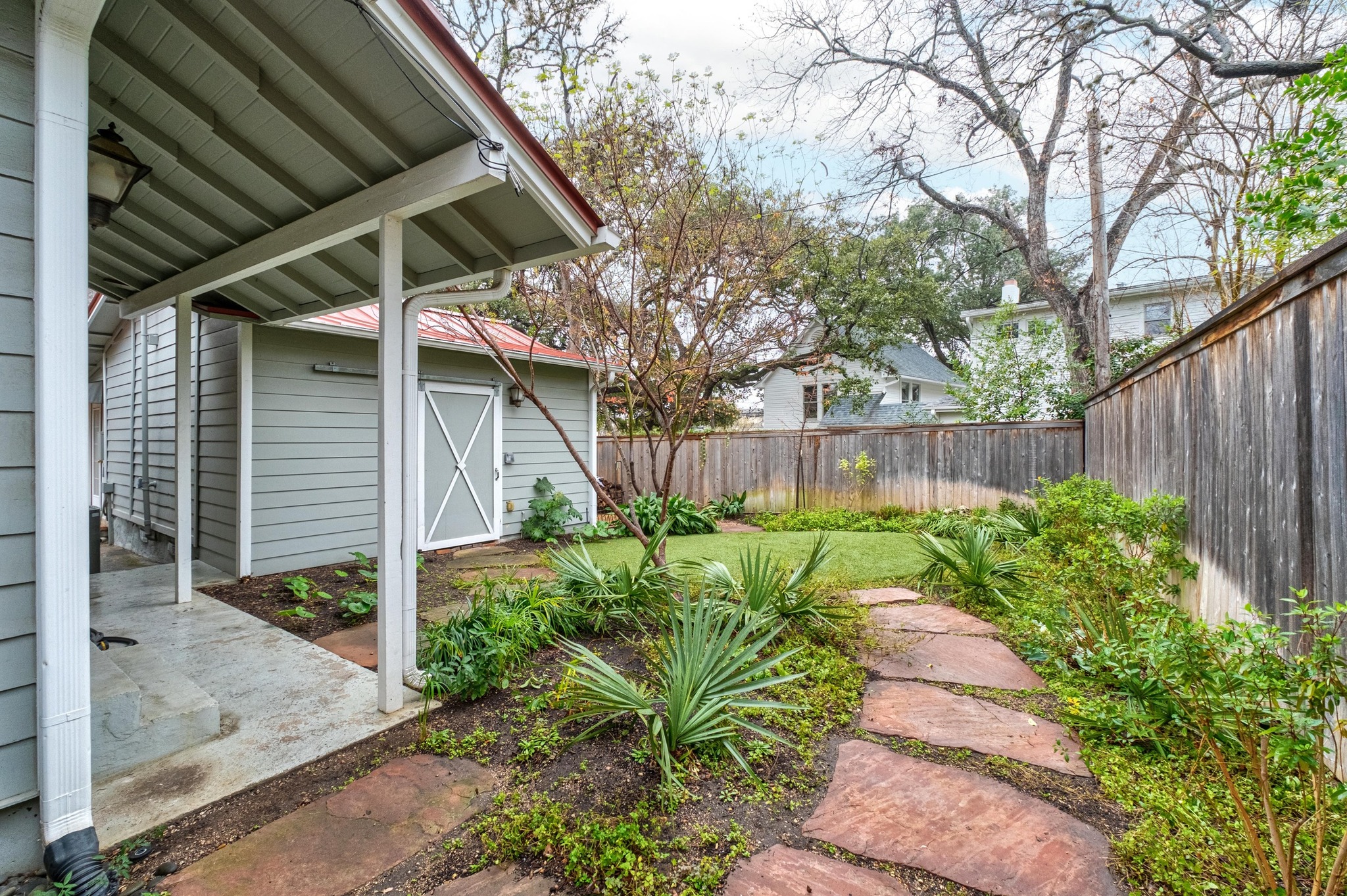 1502 Murray Lane Austin, TX 78703 - Photo 28 of 33 a view of a backyard with plants