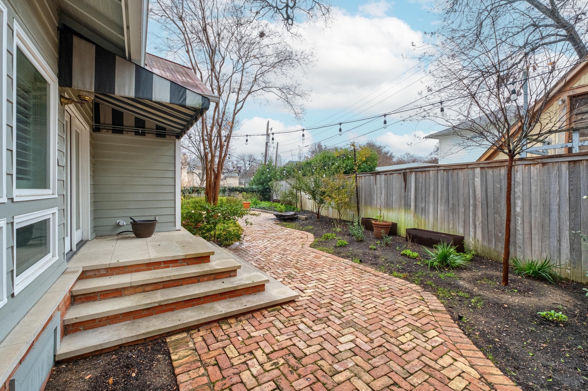 1502 Murray Lane Austin, TX 78703 - Photo 30 of 33 a view of a backyard with sitting area
