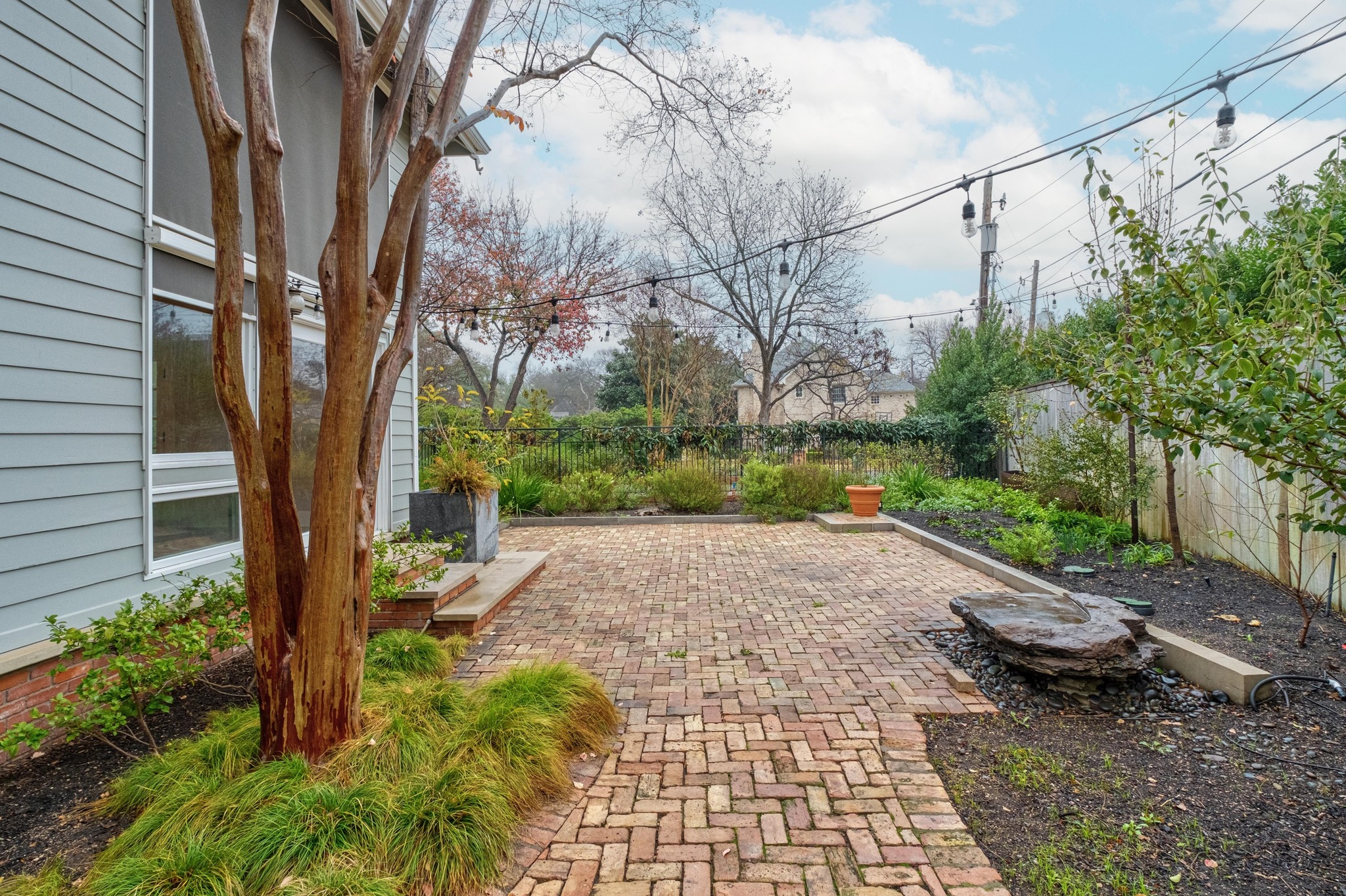 1502 Murray Lane Austin, TX 78703 - Photo 31 of 33 a view of a yard with plants and trees