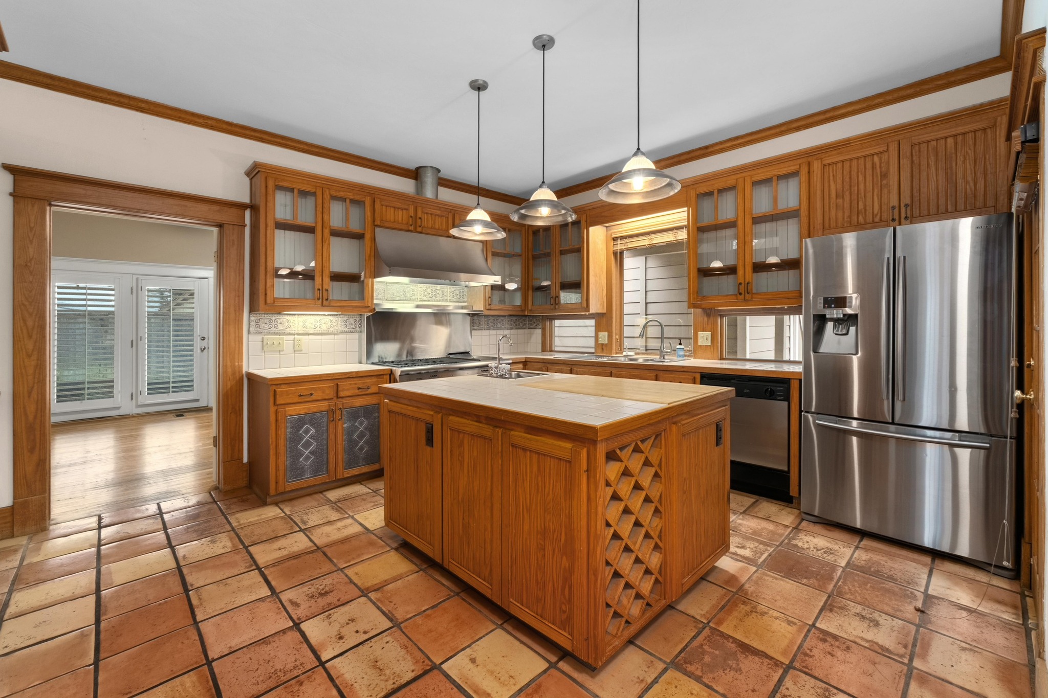 1502 Murray Lane Austin, TX 78703 - Photo 8 of 33 a kitchen with stainless steel appliances granite countertop a refrigerator and a sink