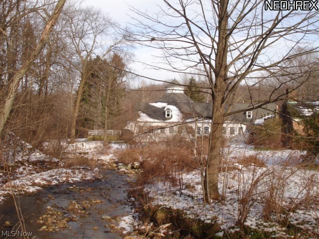 9224 Sperry Road Mentor, OH 44060 - Photo 16 of 24 Creek and rear view of barn
