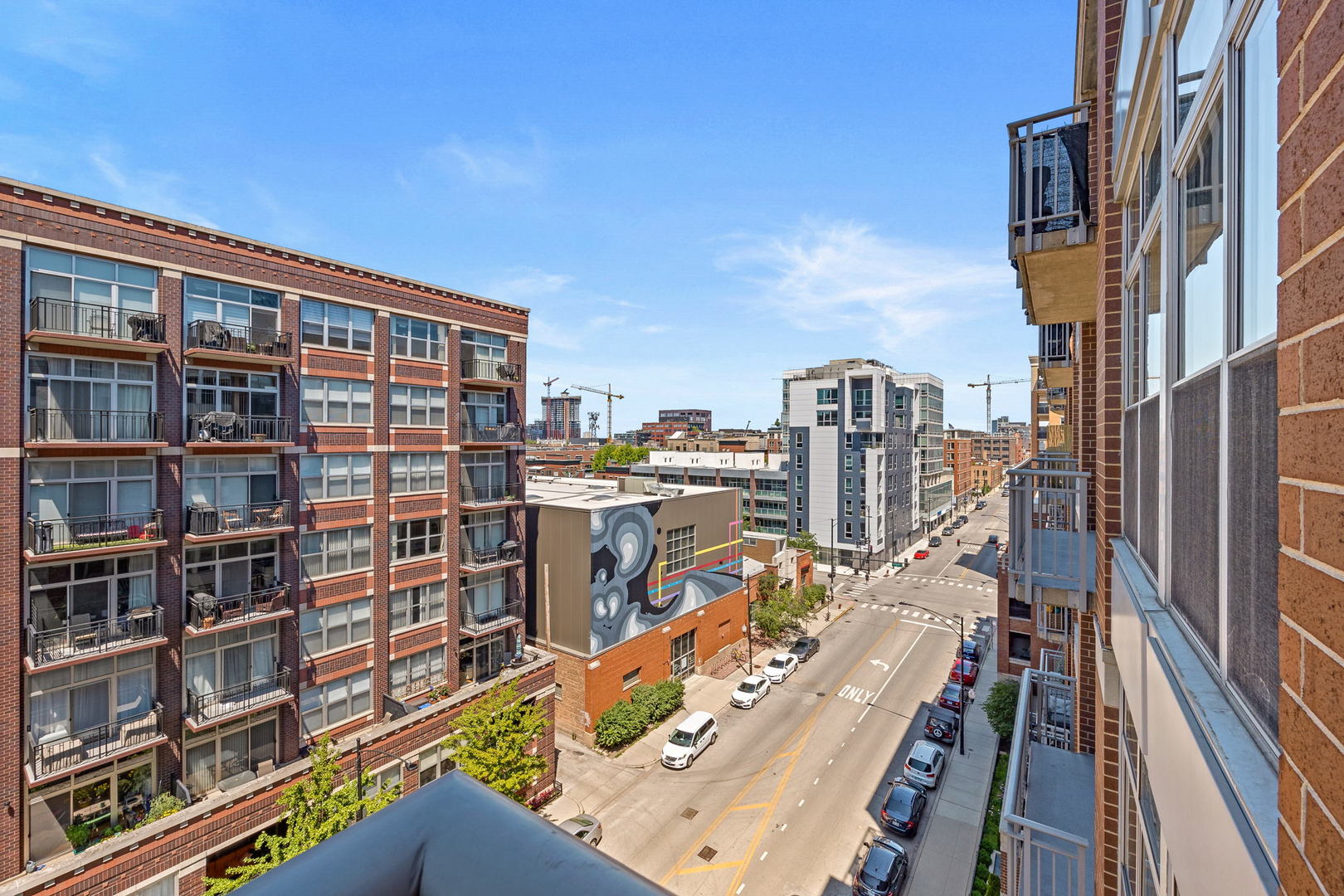 111 South Morgan Street, Unit 707 Chicago, IL 60607 - Photo 12 of 22 a view of a balcony with city view